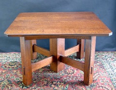 Same model table in a lighter stain.